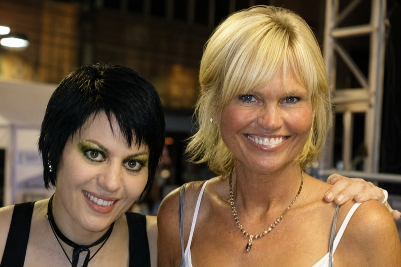 Elizabeth Lord standing beside musician Joan Jett