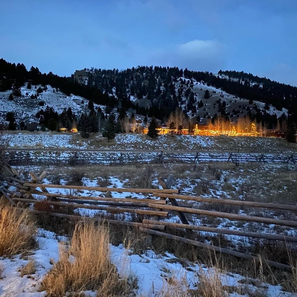Ranch photo from a distance at sunset